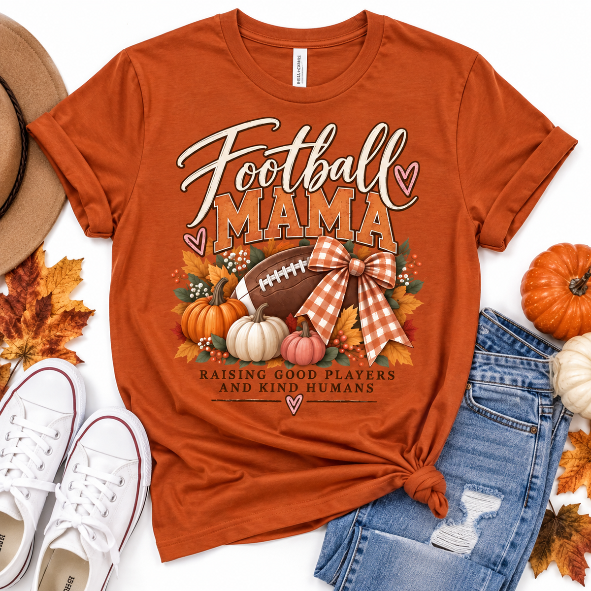 Football Mama tee | Fall pumpkins, football, plaid bow, Raising Good Players design